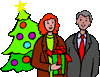 (Image: People holding presents.)